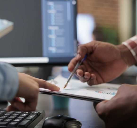 close-up-3d-digital-artists-reviewing-sketch-scene-plan-simulated-render-times-creative-industry-enthusiasts-with-cad-open-background-discussing-